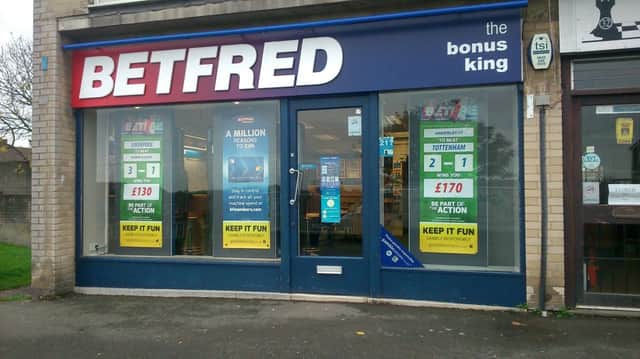 Police are appealing for information after Betfred in Framfield Way, Eastbourne, was robbed by a man wielding an axe
