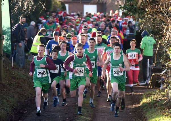 Runners set off at the start of last year's Christmas Pudding Dash. Picture by Justin Lycett