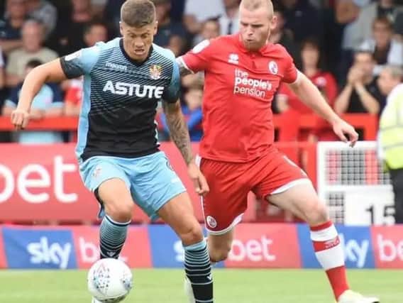 Crawley Town defender Mark Connolly, right, in action this season against Stevenage.
Picture by Liz Pearce