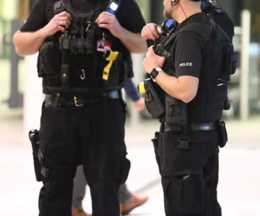 Armed police on scene at Gatwick Airport, photo by Eddie Mitchell SUS-181221-084418001