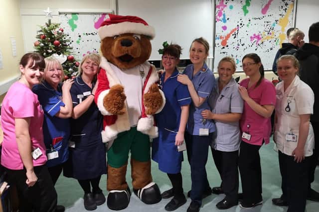 Rocky the Bear with St Richard's staff