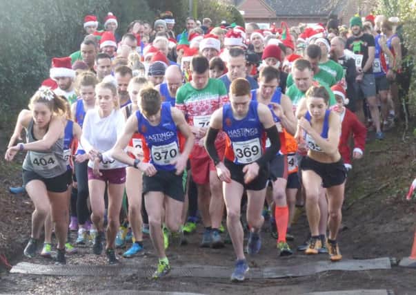 Runners set off at the start of the 13th Christmas Pudding Dash. Pictures by Simon Newstead