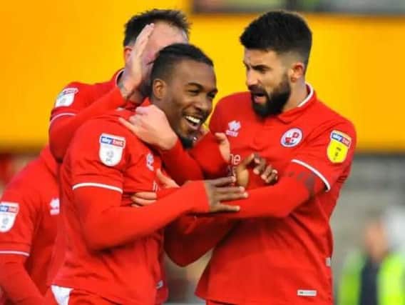 Crawley Town celebrate a goal by Dominic Poleon. Picture by Steve Robards