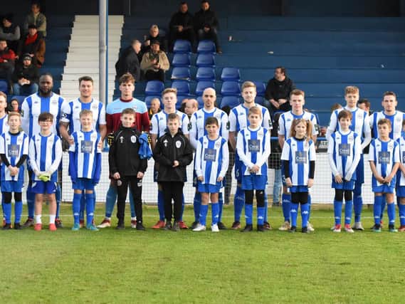 The team and today's mascots. Picture by Grahame Lehkyj