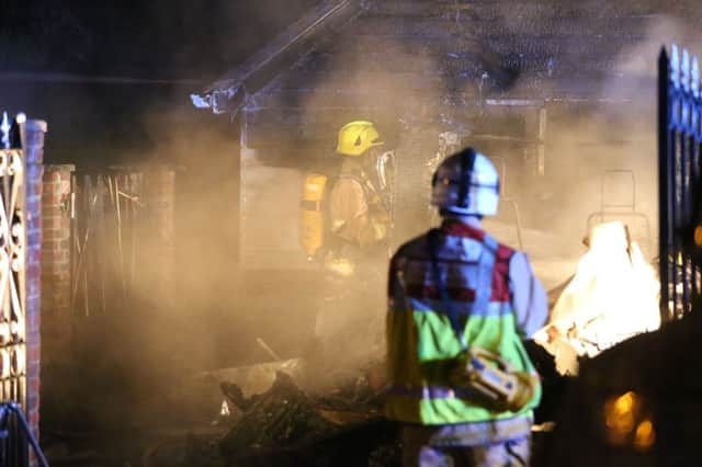 Firefighters tackle a caravan fire in Horsham SUS-181223-104448001