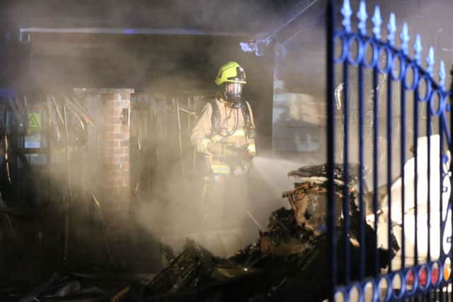Firefighters tackle a caravan fire in Horsham SUS-181223-104437001