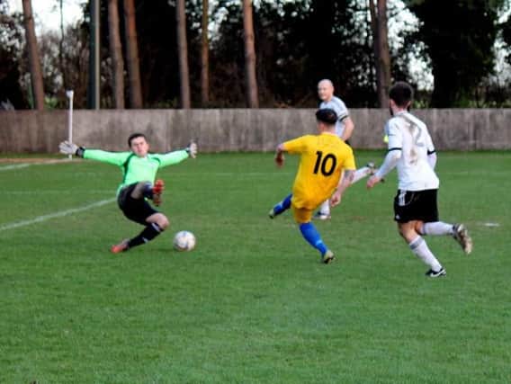 Scott Murfin - pictured scoring against Loxwood - was on target at Lancing