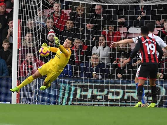 Mathew Ryan pushes away a cross in Albion's defeat at Bournemouth. Picture by PW Sporting Photography