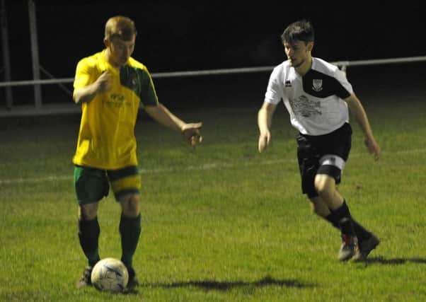 Action from Bexhill United's home fixture against Hailsham Town last season