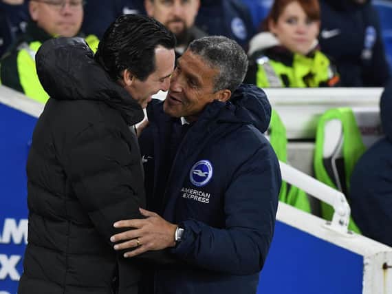 Chris Hughton greets Unai Emery. Picture by PW Sporting Photography