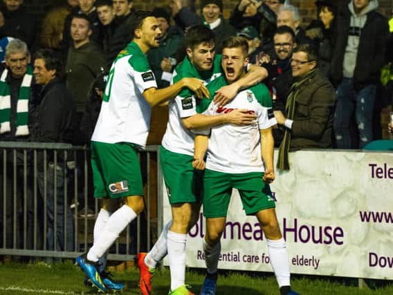 Joe Tomlinson celebrates his first Bognor goal - the equaliser - with Jimmy Muitt and Brad Lethbridge / Picture by Tommy McMillan