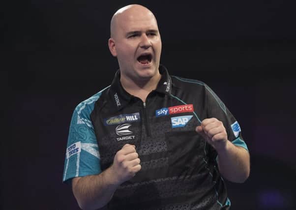Rob Cross celebrates during his third round victory over Cristo Reyes. Picture courtesy Lawrence Lustig/PDC