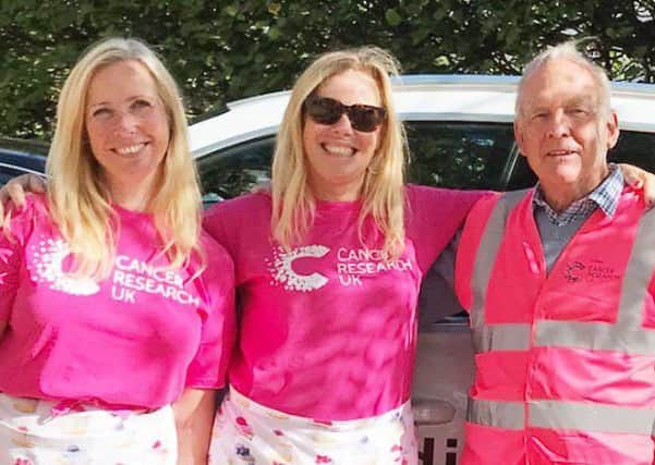 Helpers at the Pink Gift Fair held at Horsham's council offices SUS-181228-130137001