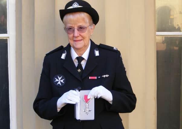 Margaret Skinner was given a MBE SUS-181129-095109003