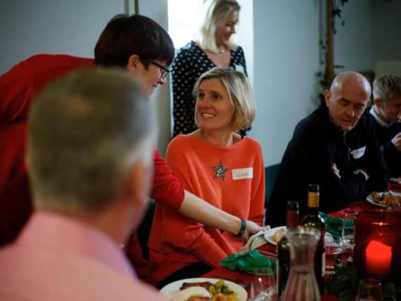 Oakwood School Headteacher, Clare Bradbury, joins guests for Christmas Day lunch at the school