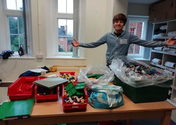 Levi Reid, a Christ's Hospital pupil, has received a cash boost to help him complete his Lego project which will see him build a replica of his school using 60,000 Lego bricks SUS-190201-150624001