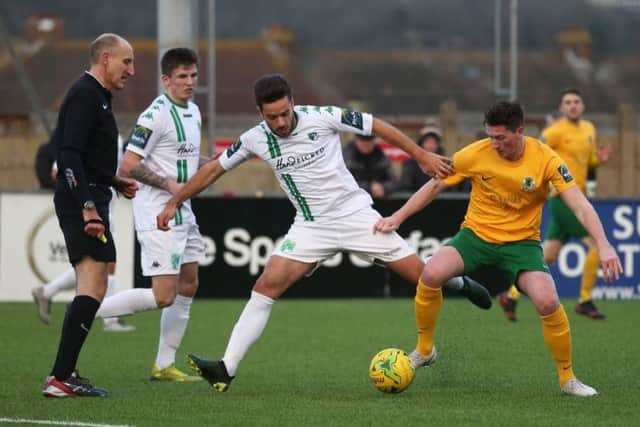 Horsham v Guernsey - Charlie Harris in action. Picture by John Lines