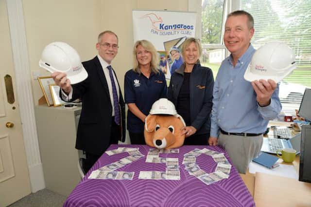 Taylor Wimpey gave Â£250 to Kangaroos, a charity which supports children and young adults with learning disabilities in Sussex