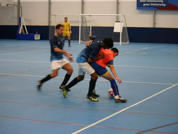 Futsal action at the University of Chichester sports dome / Picture by Jordan Colborne