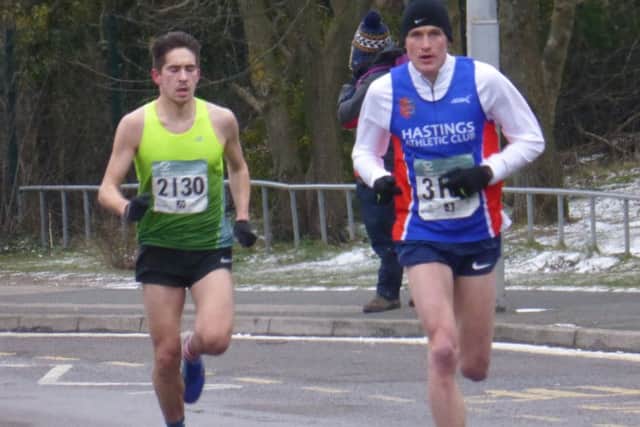Adam Clarke on his way to victory in the Hastings Half Marathon with runner-up Charlie Joslin-Allen close behind. Picture by Simon Newstead
