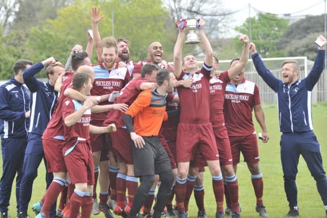 Little Common Football Club celebrates with the Macron Store Southern Combination League Division One trophy. Picture by Simon Newstead