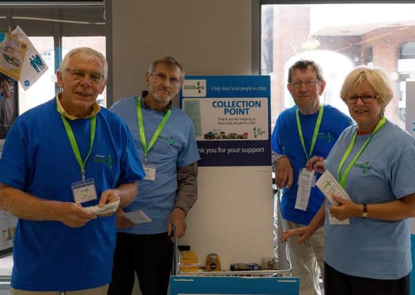Volunteers at the Shoreham Foodbank collection point at The Co-Op in Ham Road