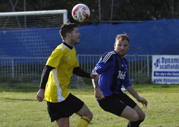 Hollington United in action against Burgess Hill Albion during November. Picture by Simon Newstead
