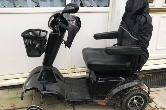 Damaged mobility scooter following the crash