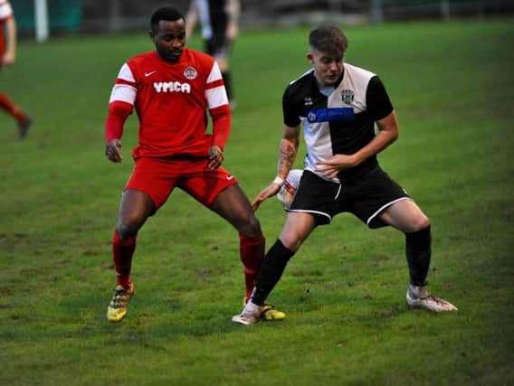 Horsham YMCA's Tony Nwachukwu in action earlier in the season. Picture by Stephen Goodger