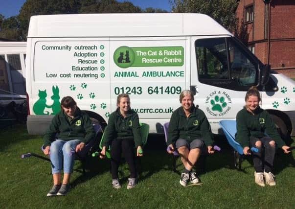 Cat and Rabbit Rescue volunteers with the donated wheelbarrows