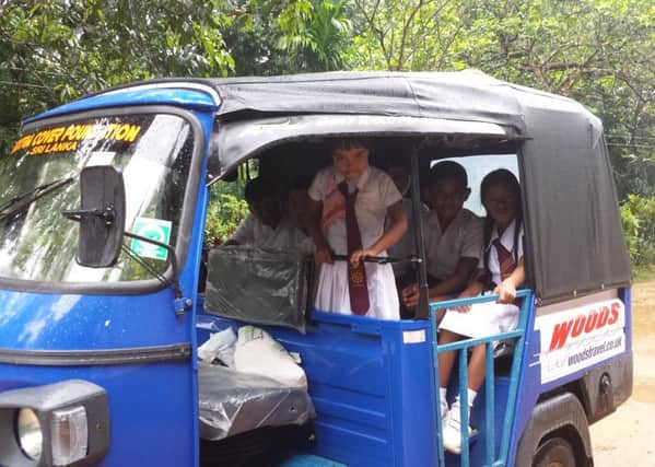 Many children can fit in each Woods Travel tuk tuk