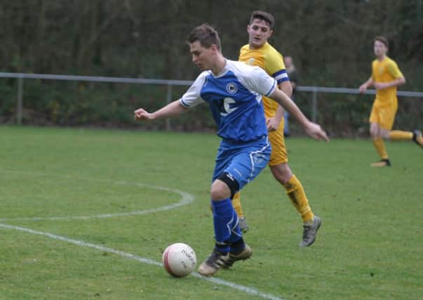 Patrick O`Sullivan (blue) opened up the scoring for Roffey. Photo by Clive Turner
