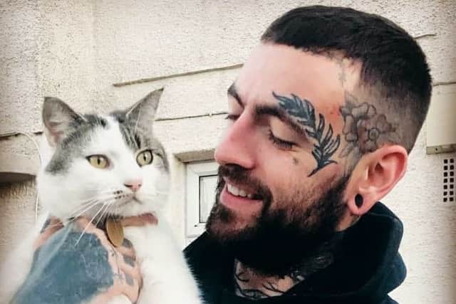 Rudi Ridgewell with Bruno, a cat that gets up to all sorts of scrapes in Worthing
