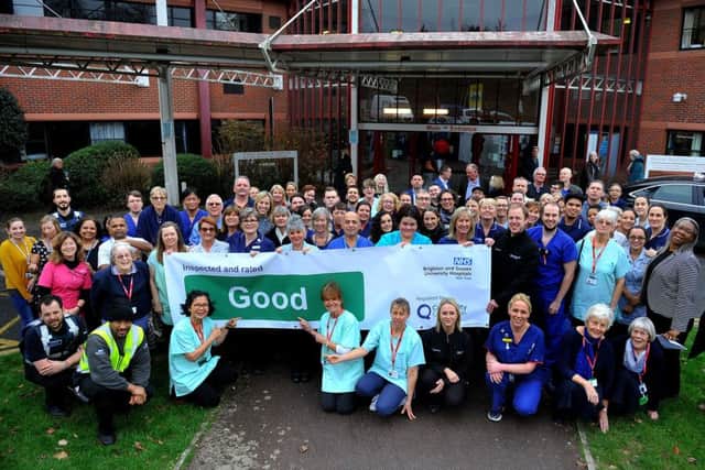 Princess Royal Hospital staff display banner showing their Good CQC rating, Haywards Heath. Pic Steve Robards