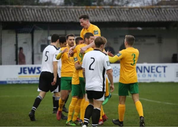 Faversham Town v Horsham - Rob O'Toole is mobbed after giving the visitors the lead. Picture by John Lines
