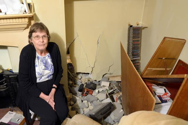 Joan Blackwood, 62, from Surrey Street, Littlehampton. Her chair is normally where the car hit the wall, and its current position is where it moved to from the impact