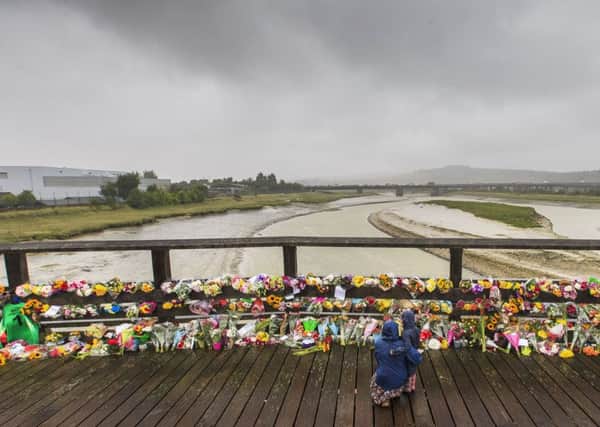 Floral tributes left on the Old Toll Bridge in Shoreham, after the Shoreham air crash in August