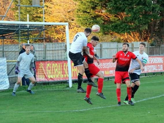 Pagham in recent action against Hassocks - and it was another mid-Sussex side, Burgess Hill, who knocked them out of the Sussex Senior Cup / Picture by Roger Smith