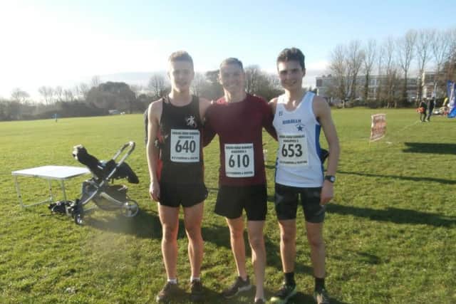 Race winner Andrew McCaskill (centre), second-placed Luke Burgess (right) and Toby Nisbet