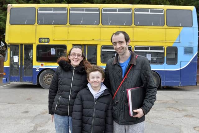 Christopher Bedford, Claire and Kayden with the Big Bus for the homeless (Photo by Jon Rigby)