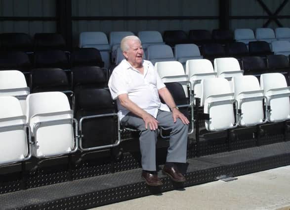 Bill Parris in the new stand at Peacehaven FC when it opened in 2011