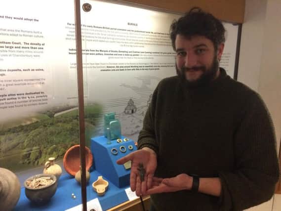 Archaeological curator James Sainsbury with the Venus statuette