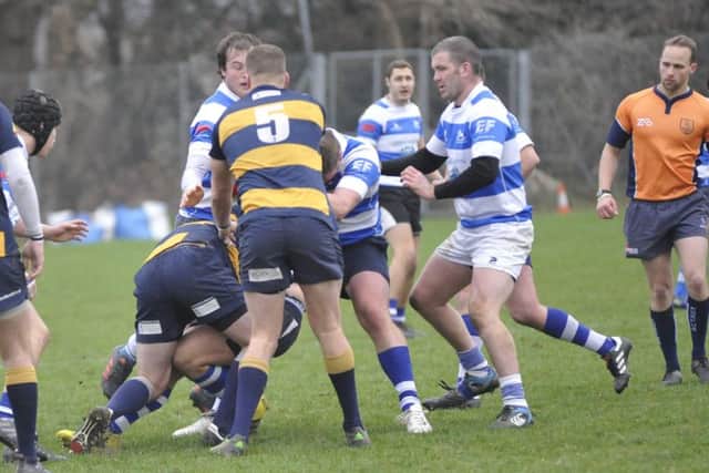 Hastings & Bexhill and Old Williamsonians tussle for possession