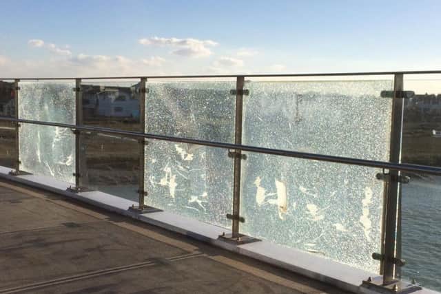 Broken panels on the Adur Ferry Bridge