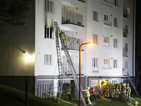 Crews tacking high rise fire in Brighton