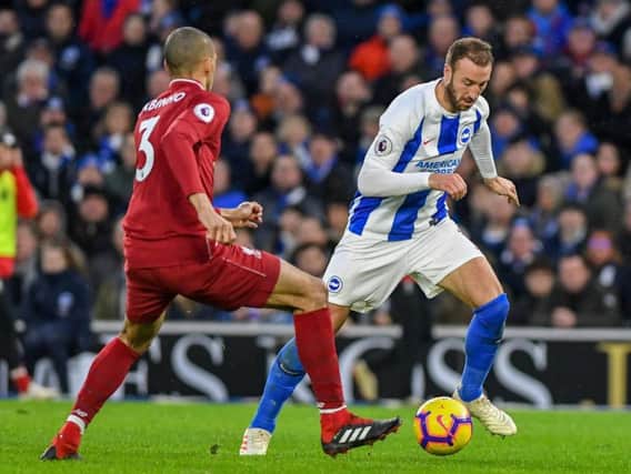 Glenn Murray takes on Fabinho. Picture by PW Sporting Photography