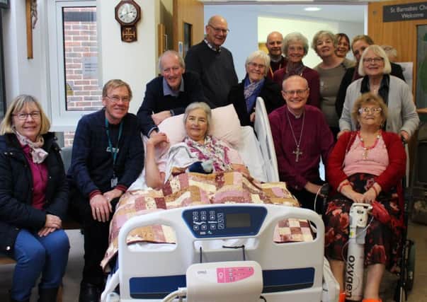 Bishop Mark Sowerby with patients, families, staff and volunteers at St Barnabas House in Worthing SUS-190115-110852001