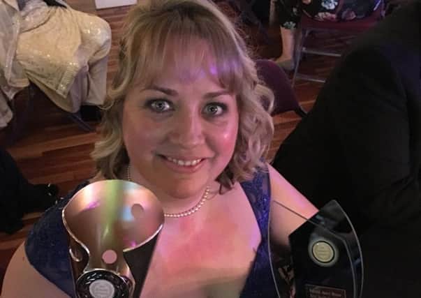 Sarah from Sure Aesthetics with her awards