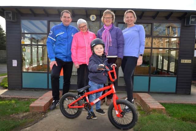 Battle Recreation Ground:

Rufus Coleman with his bike and L-R Gary Walsh (Rep for Battle Baptist Football Club and Fit for Battle), Cllr Glenna Favell, Sue Burton (Project Manager Battle Health Pathway) and runner Deborah Winchester. SUS-190801-124928001