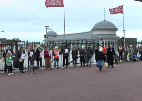Hundreds queued up outside Hastings Pier to show their love for the landmark